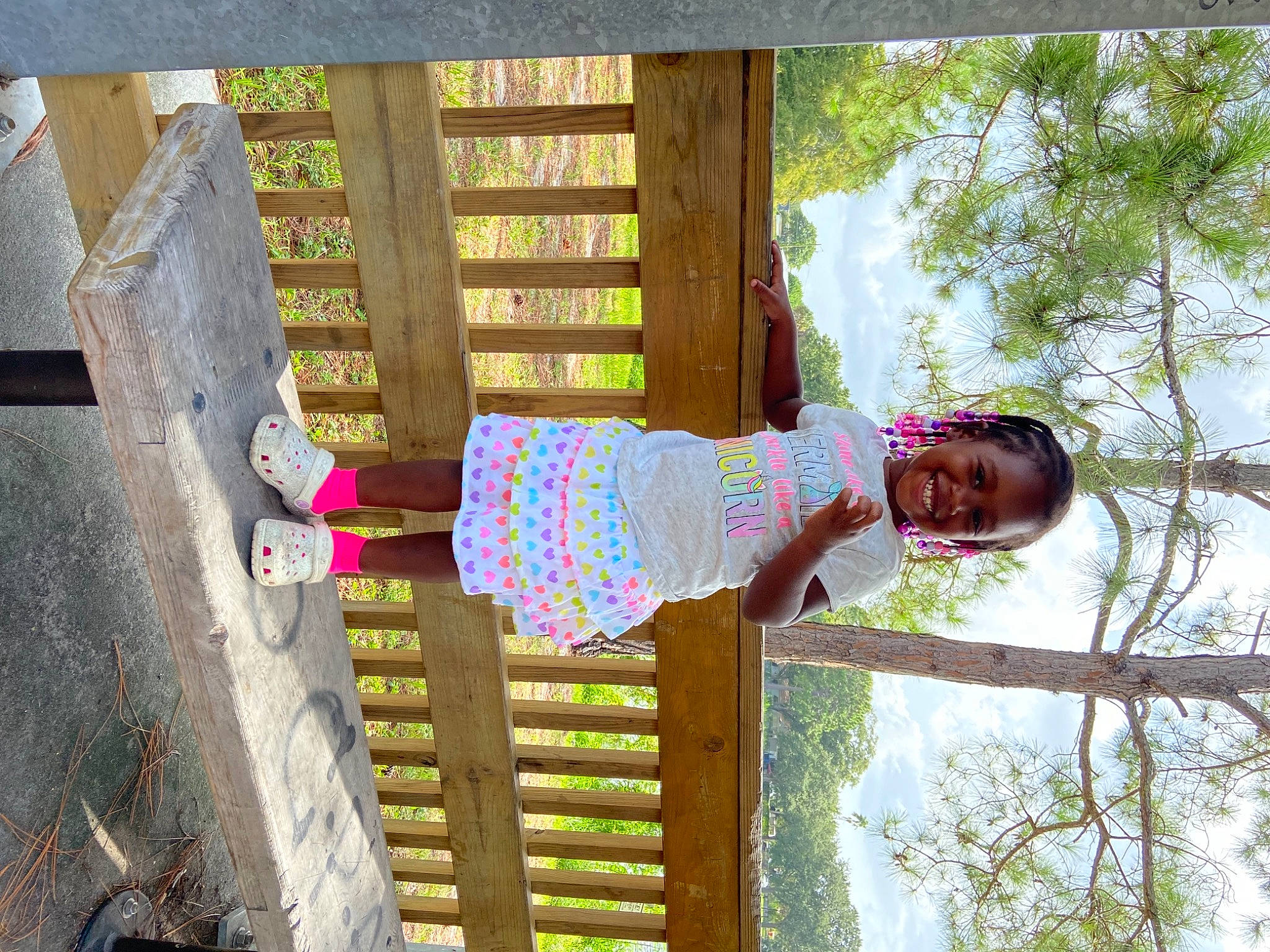 Gabby is registered to the contest to win money with this photo: adaptation, beauty, child, fun, grass, happy, joy, leisure, magenta, pattern, people_in_nature, person, plant, sky, spring, tints_and_shades, toddler, tree, vacation, waist