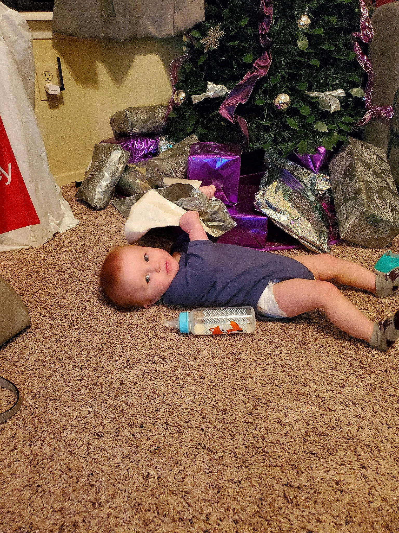 Kace is registered to the contest to win money with this photo: child, floor, flooring, fun, joy, leg, person, toddler, tree