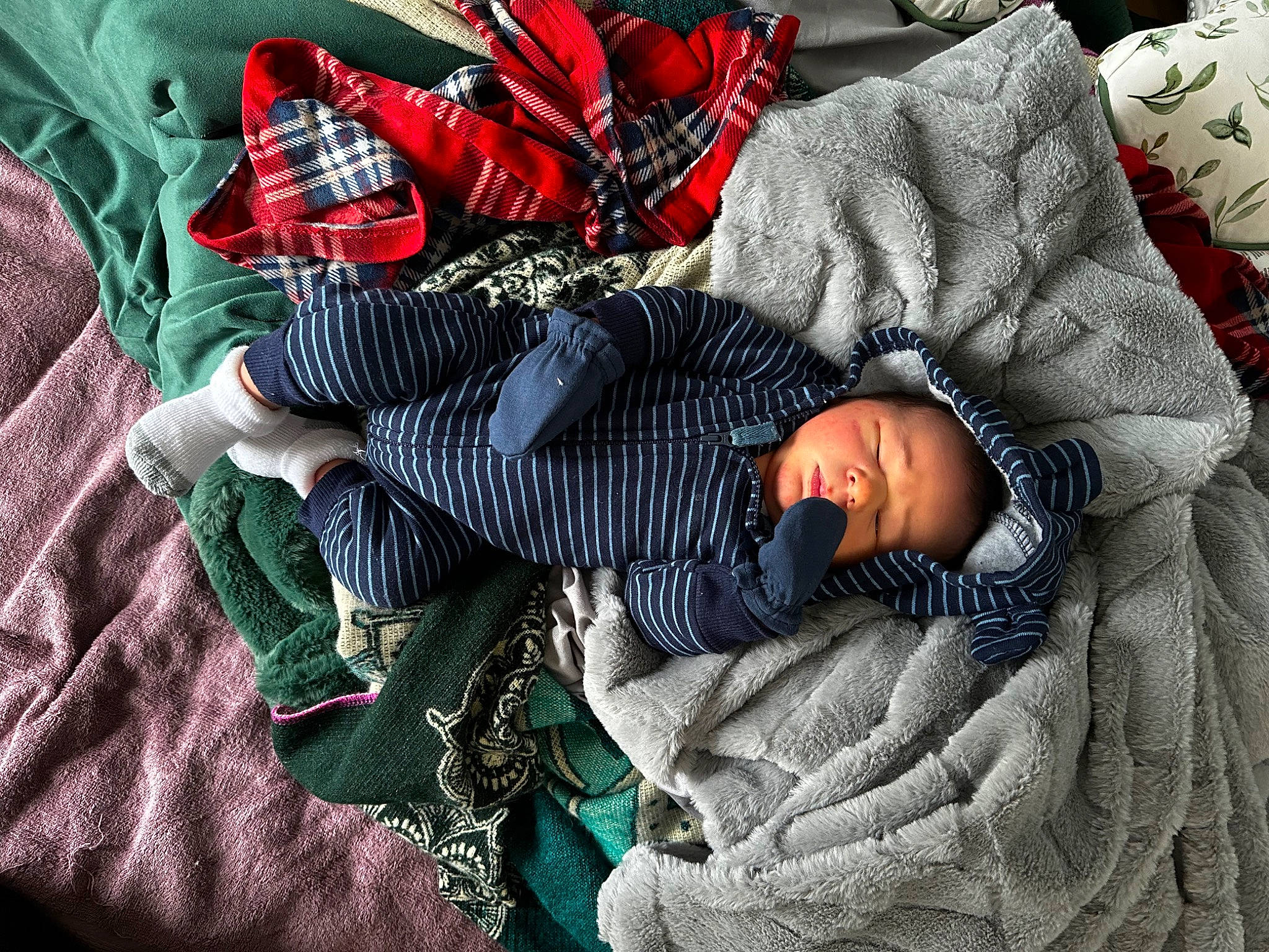 Kyro is registered to the contest to win money with this photo: baby, baby_products, baby_toddler_clothing, bedding, carmine, child, comfort, grey, linens, nap, pattern, person, plaid, room, sitting, sleep, sleeve, tartan, textile, toddler