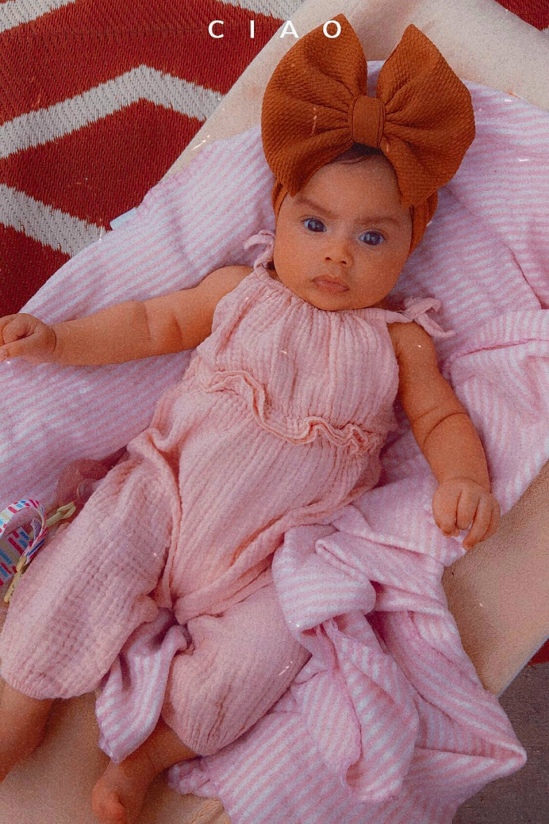 Karly joined the competition — help win amazing prizes! arm, baby_toddler_clothing, bridal_accessory, day_dress, doll, dress, embellishment, eyelash, hair_accessory, headpiece, linens, lip, magenta, outerwear, pattern, person, pink, sleeve, textile, toy