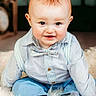 Josiah is registered to the contest to win money with this photo: baby, child, infant, smiling, blue_clothing, bow_tie, suspenders, mohawk_hairstyle, fluffy_rug, indoor, wooden_floor, portrait, cute, happy, sitting, face, person, young_child, light_blue_shirt, casual