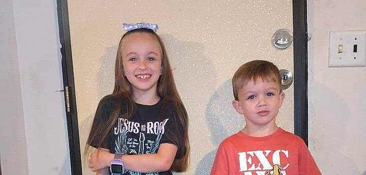 Preslee is registered to the contest to win money with this photo: camera, child, event, face, facial_expression, fun, hairstyle, happy, joy, leisure, party, person, recreation, room, sharing, single_lens_reflex_camera, smile, standing, summer, t_shirt