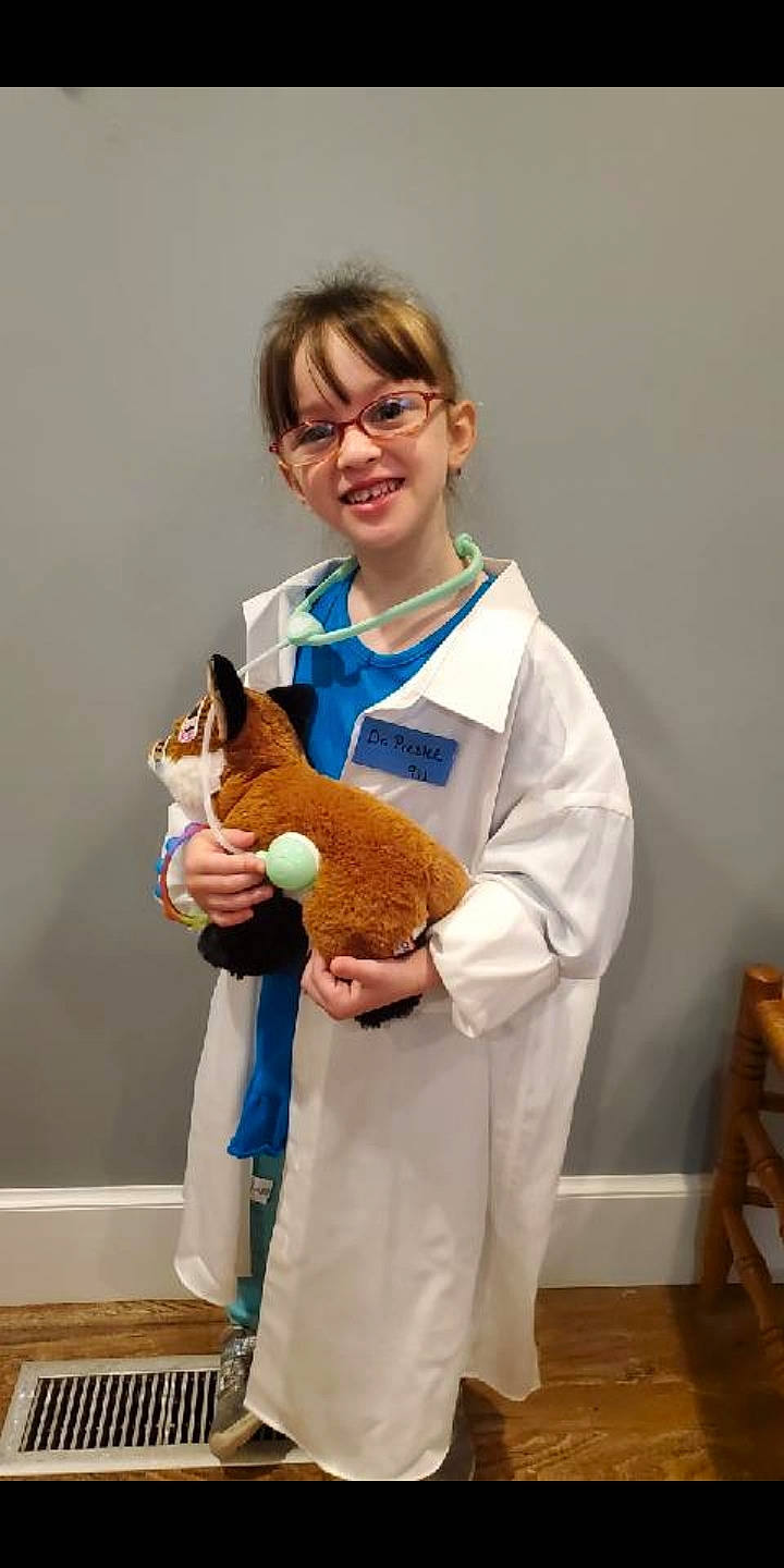 Preslee is registered to the contest to win money with this photo: abdomen, child, companion_dog, fawn, felidae, fish, fur, glasses, glove, guinea_pig, joint, joy, person, plush, rabbit, room, small_to_medium_sized_cats, smile, stuffed_toy, toy
