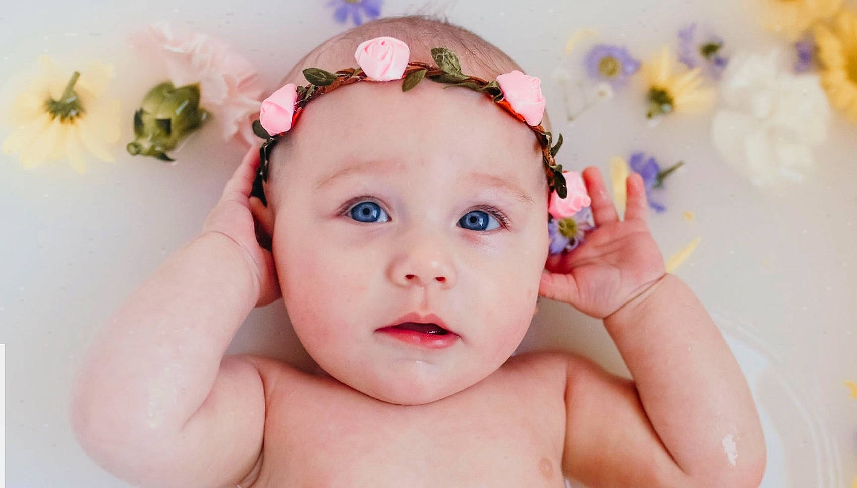 Laikyn is registered to the contest to win money with this photo: baby, cheek, child, child_model, ear, face, fashion_accessory, forehead, hair_accessory, hand, head, headband, headgear, headpiece, lip, mouth, person, photography, pink, skin
