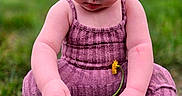 River is registered to the contest to win money with this photo: baby, barefoot, child, closeup, curly_hair, cute, dandelion, daylight, flower, grass, greenery, innocence, nature, outdoor, playful, portrait, purple_outfit, sitting, summer, toddler