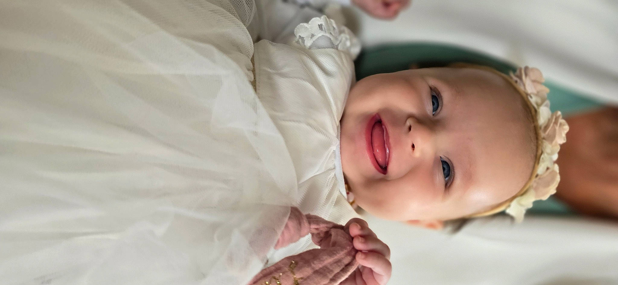 Lila a rejoint le concours — aidez-le/la à gagner de superbes lots ! baby, baby_laughing, baby_toddler_clothing, cheek, child, chin, comfort, dress, eyebrow, eyelash, flash_photography, gesture, happy, iris, joy, lip, nose, person, skin, smile
