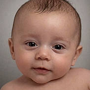 Harper joined the competition — help win amazing prizes! baby, infant, face, portrait, skin, cute, child, eyes, smile, head, young, expression, human, closeup, innocence, soft, background, curly_hair, chubby_cheeks, natural_light
