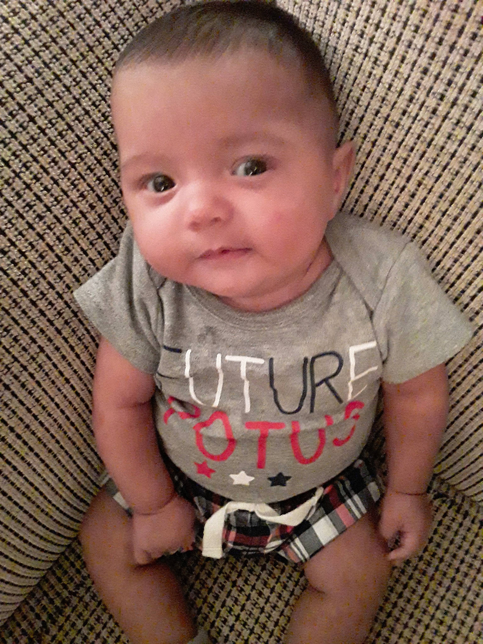 Kaine joined the competition — help win amazing prizes! baby, baby_toddler_clothing, cheek, child, design, head, pattern, person, plaid, sitting, skin, smile, toddler