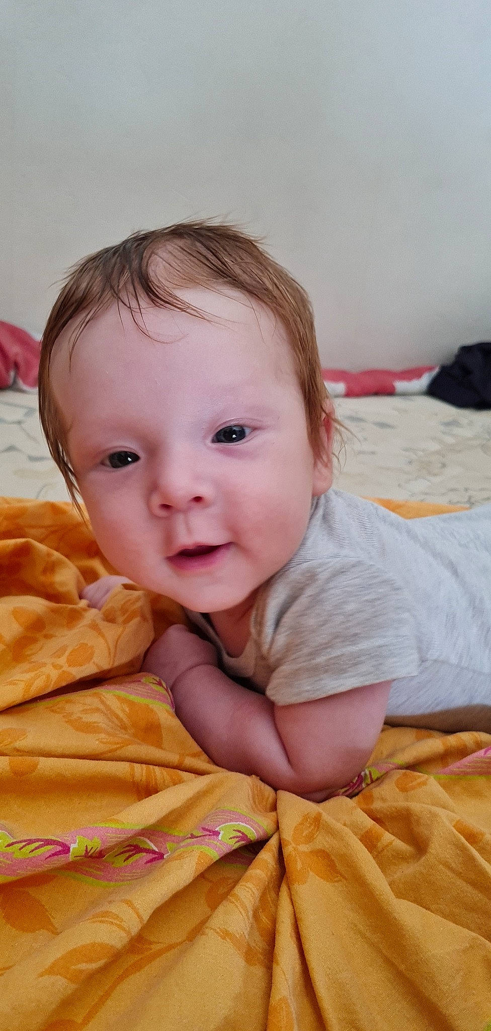 Iulian participe au concours pour gagner de l'argent avec cette photo : baby, baby_toddler_clothing, cheek, child, comfort, eye, face, happy, head, human_body, iris, lip, mouth, neck, nose, person, pink, skin, sleeve, smile