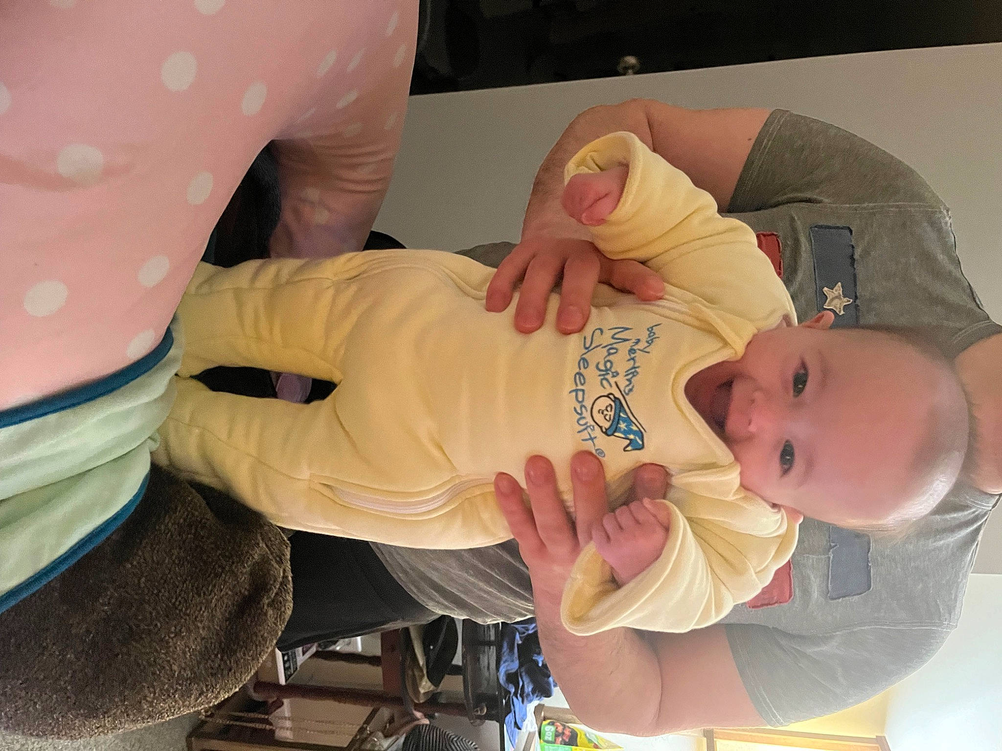 Lillie is registered to the contest to win money with this photo: abdomen, arm, baby, baby_products, baby_toddler_clothing, cheek, child, comfort, elbow, finger, hand, hat, human_body, mammal, mouth, nail, person, room, sleeve, thumb