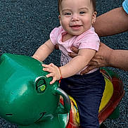 Sahara joined the competition — help win amazing prizes! bracelet, child, cute, earrings, fun, green, hands, happy, jeans, outdoor, person, pink_shirt, play, playground, smiling, support, toddler, toy, turtle, young