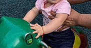 Sahara joined the competition — help win amazing prizes! bracelet, child, cute, earrings, fun, green, hands, happy, jeans, outdoor, person, pink_shirt, play, playground, smiling, support, toddler, toy, turtle, young