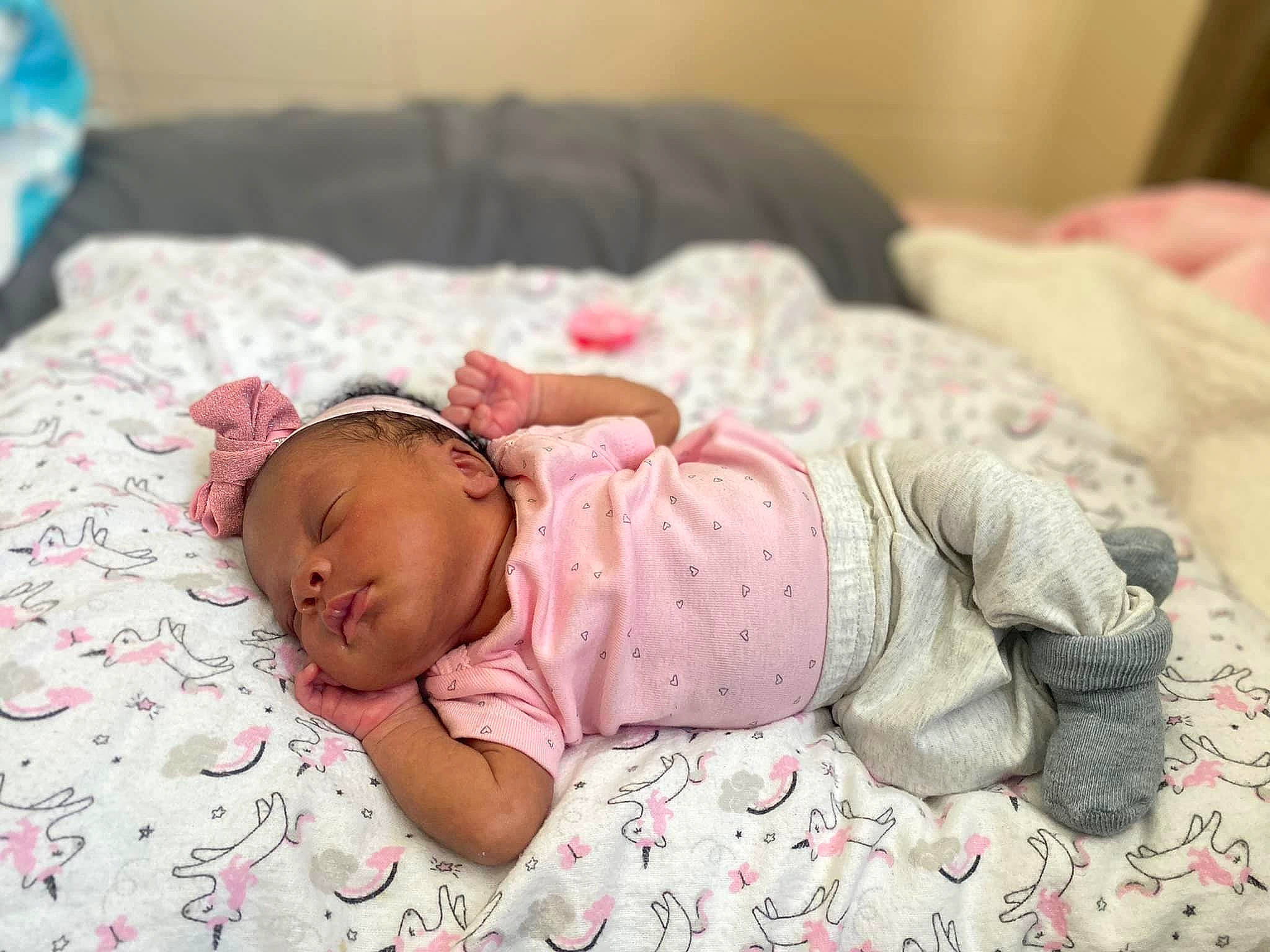 Kennedy joined the competition — help win amazing prizes! baby, baby_products, baby_sleeping, baby_toddler_clothing, bedding, bedtime, cheek, child, comfort, eye, grass, hair, head, headgear, human_body, linens, person, sitting, sleeve, toddler