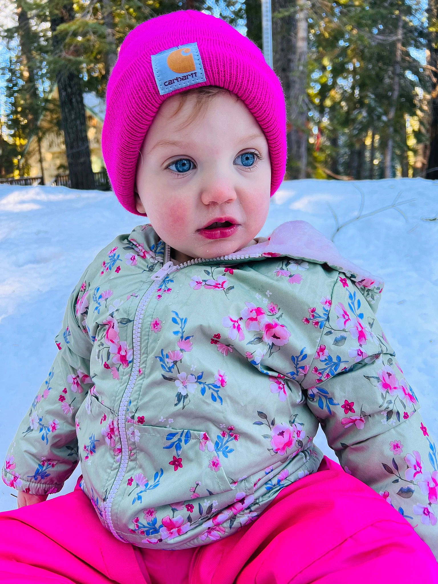 Emmi joined the competition — help win amazing prizes! baby_toddler_clothing, beauty, cap, eye, face, grass, happy, head, headgear, headwear, jacket, leisure, magenta, outerwear, pattern, person, pink, sleeve, snow, surprise