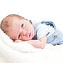 baby, infant, newborn, blanket, soft, blue_clothing, face, head, skin, lying_down, resting, cute, small, child, portrait, indoors, cozy, peaceful, sleepy, person