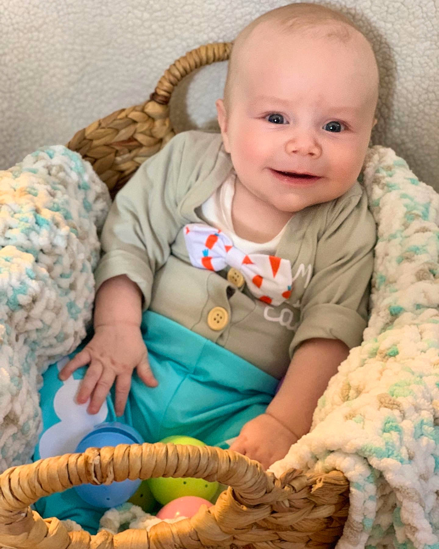Casey joined the competition — help win amazing prizes! arm, baby, baby_toddler_clothing, cheek, comfort, eye, face, facial_expression, finger, green, hand, head, iris, joy, mouth, neck, nose, person, skin, sleeve