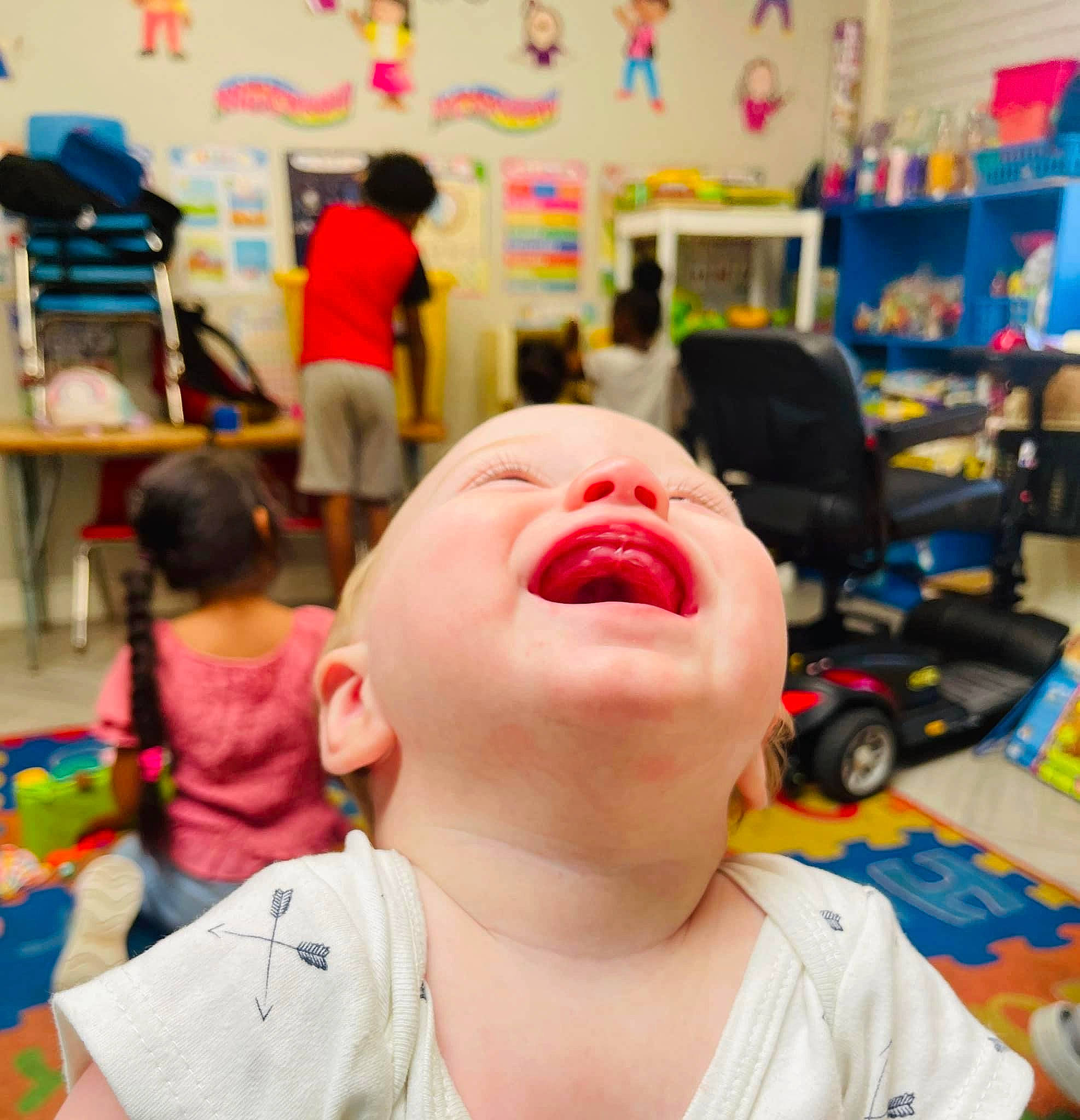 August is registered to the contest to win money with this photo: child, customer, eyewear, fun, happy, hat, kindergarten, leisure, person, personal_protective_equipment, photograph, play, recreation, room, skin, smile, snapshot, summer, t_shirt, toddler