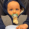 Kaden participe au concours pour gagner de l'argent avec cette photo : baby, pacifier, hoodie, blue_eyes, blanket, child, infant, clothing, warm, cute, portrait, hand, indoor, seatbelt, sitting, face, expression, young_child, closeup, soft_texture