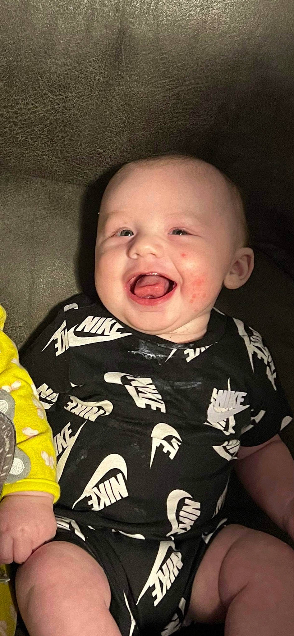 Ryker is registered to the contest to win money with this photo: baby, baby_toddler_clothing, cheek, chin, eye, face, facial_expression, hand, head, human, human_body, lip, mammal, mouth, neck, nose, outerwear, person, skin, sleeve