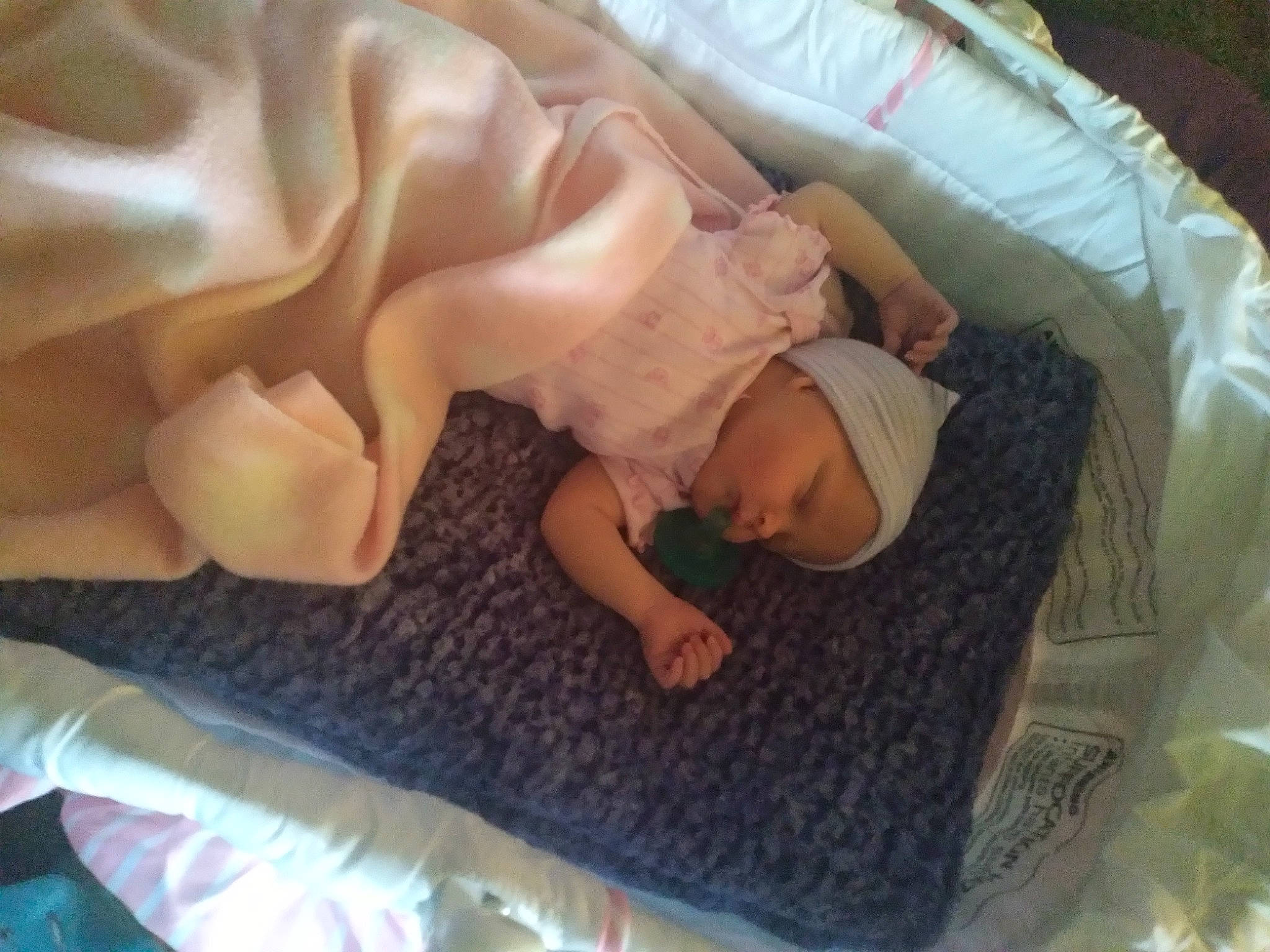 Olivia joined the competition — help win amazing prizes! arm, art, baby, bed, bedding, bedtime, child, comfort, finger, gesture, hand, head, headwear, human_body, human_leg, linens, nap, person, skin, thumb