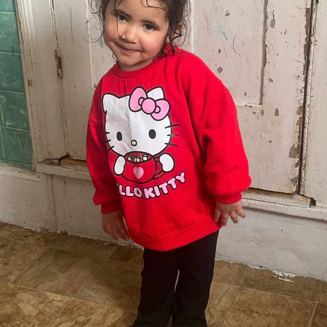 Paityn joined the competition — help win amazing prizes! boy, child, clothing, coat, door, face, footwear, head, knitwear, longsleeve, male, pants, person, photography, portrait, shoe, sleeve, sweater, t_shirt, wood