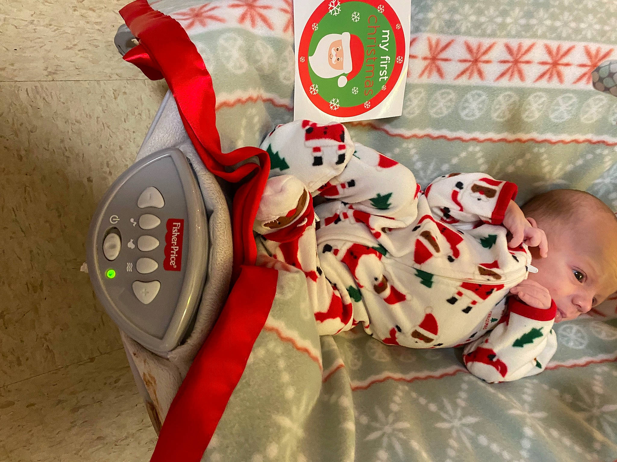 Karsyn is registered to the contest to win money with this photo: baby, baby_toddler_clothing, carmine, christmas, comfort, fictional_character, font, foot, glove, happy, holiday, human_body, linens, megaphone, nightwear, pattern, person, sleeve, stuffed_toy, toddler