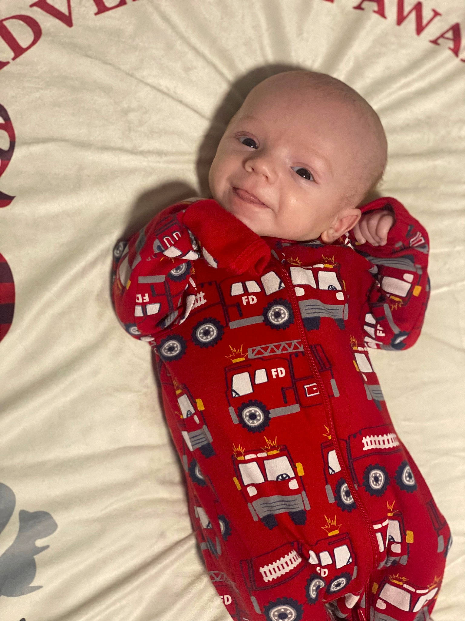 Karsyn is registered to the contest to win money with this photo: arm, baby, baby_toddler_clothing, cheek, clothing, collar, face, facial_expression, head, iris, lip, neck, nose, outerwear, person, pink, red, skin, sleeve, standing