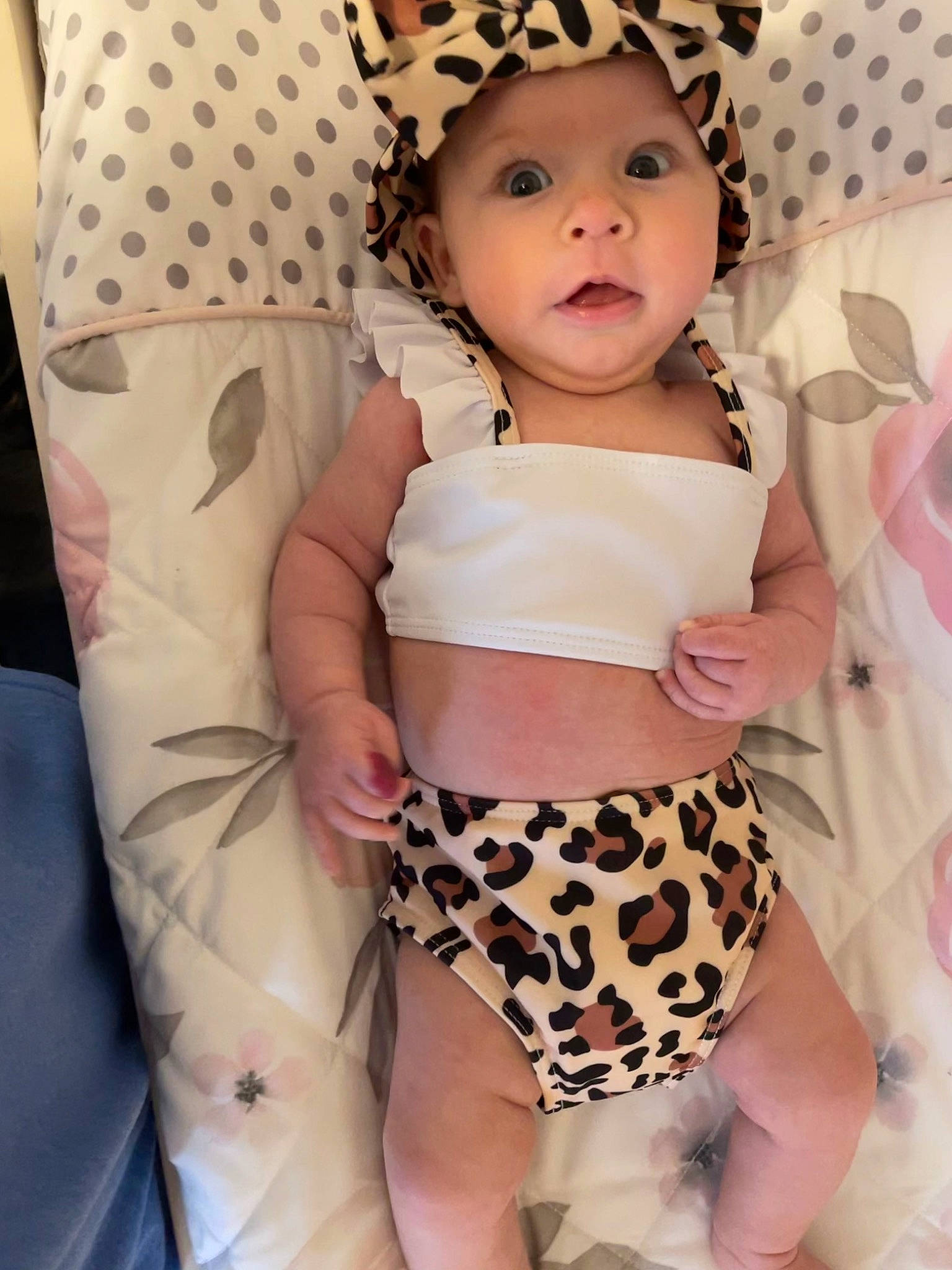Brynley is registered to the contest to win money with this photo: arm, baby_toddler_clothing, child, eye, fashion, finger, hand, head, headwear, human_body, leg, neck, organ, person, pink, shorts, skin, sleeve, stomach, surprise