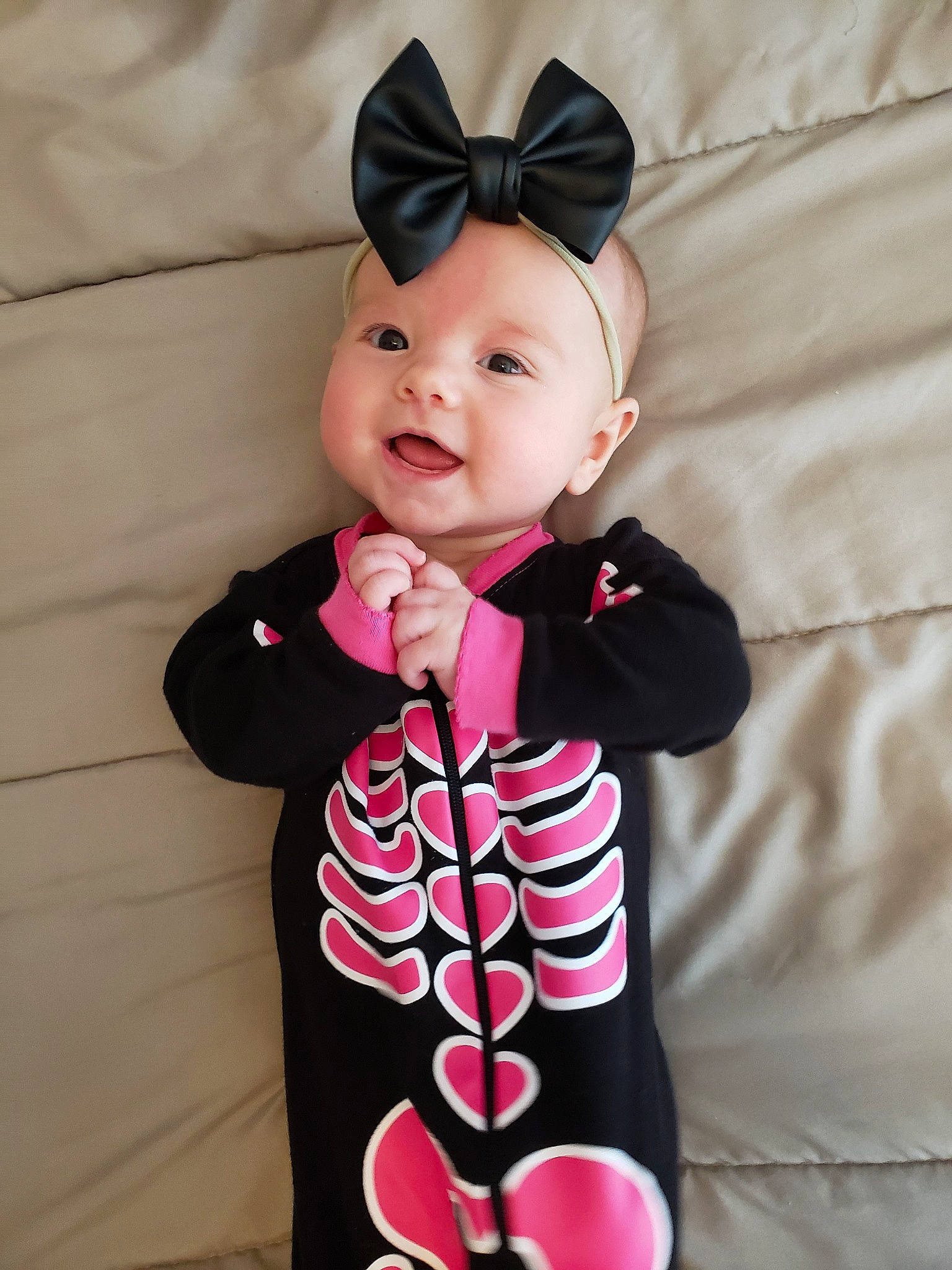 Maddy is registered to the contest to win money with this photo: baby, baby_toddler_clothing, child, clothing, costume, ear, fashion_accessory, hair_accessory, neck, pattern, person, pink, product, sleeve, textile, toddler