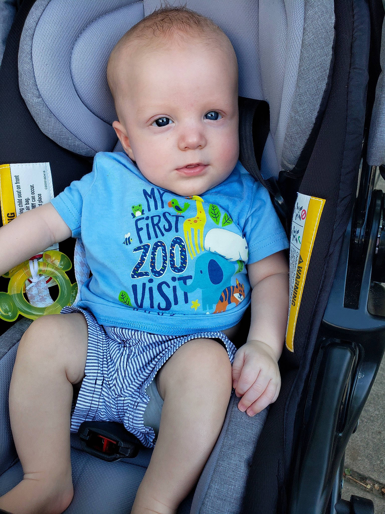David is registered to the contest to win money with this photo: baby, baby_carriage, baby_in_car_seat, baby_products, baby_toddler_clothing, car_seat, child, person, product, sitting, skin, toddler