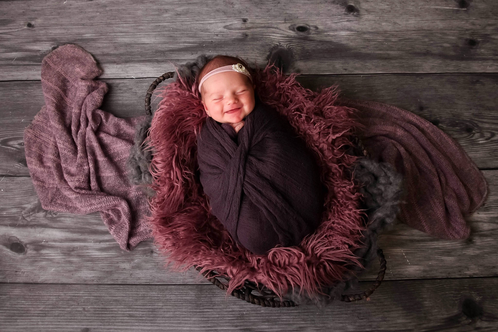 Presley is registered to the contest to win money with this photo: comfort, darkness, fashion_design, flash_photography, flooring, fun, fur, fur_clothing, grey, happy, headwear, human_body, joy, magenta, outerwear, person, sitting, smile, textile, tints_and_shades