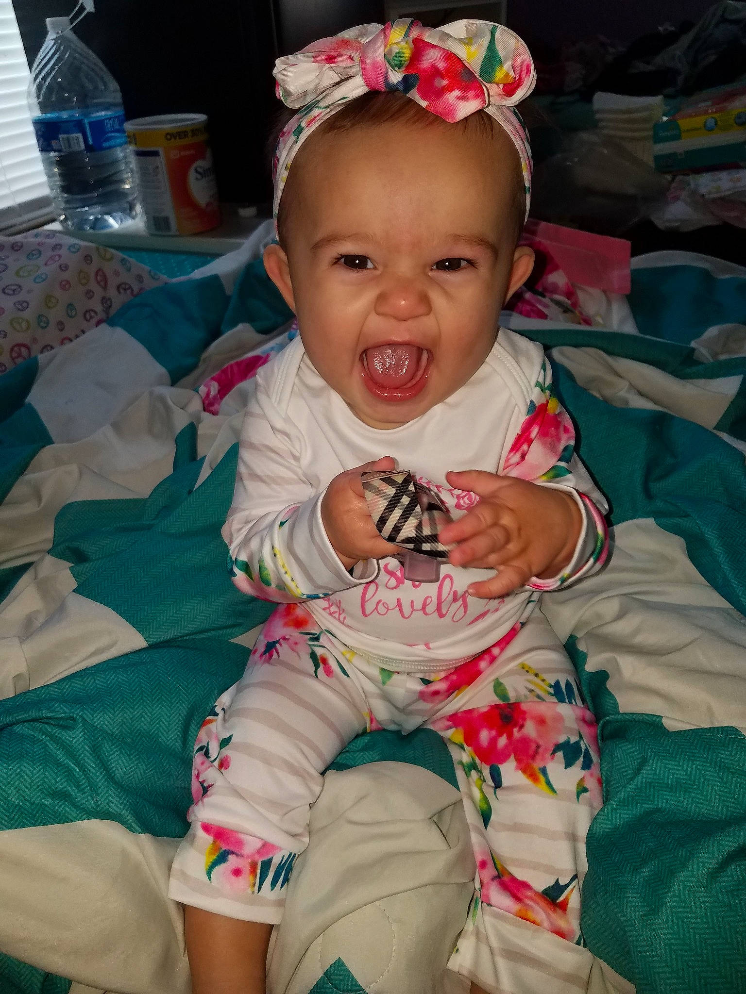 Ariah is registered to the contest to win money with this photo: baby, cheek, child, headgear, person, sitting, skin, smile, toddler