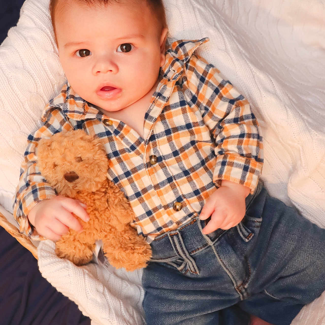 Waylon is registered to the contest to win money with this photo: baby, bed, blanket, bodypart, clothing, couch, face, finger, furniture, hand, happy, head, jeans, pants, person, photography, portrait, sitting, teddybear, toy