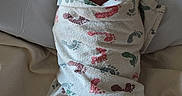 Lorene Hazel joined the competition — help win amazing prizes! newborn, baby, swaddled, blanket, footprint_pattern, hat, bow, sleeping, bed, sheet, infant, cute, peaceful, soft, resting, portrait, person, indoors, child, wrapped