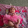 baby, infant, pink, tutu, headband, quilt, hearts, bows, cute, child, clothing, fabric, pattern, portrait, laying, hands, feet, colorful, playmat, indoors