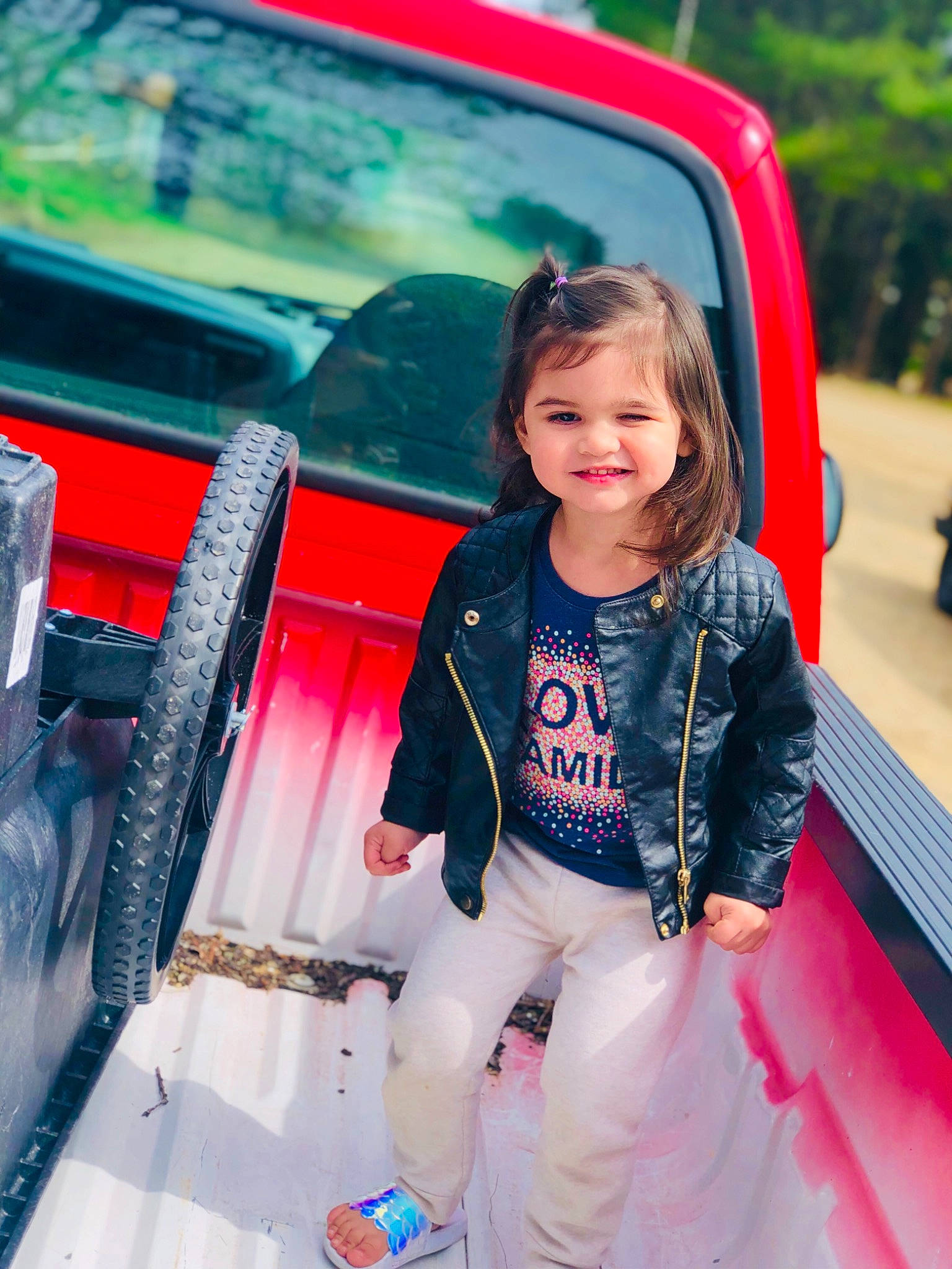 Kaitlynn is registered to the contest to win money with this photo: automotive_window_part, car, child, child_model, family_car, fun, happy, jeans, joy, person, photography, pink, red, skin, smile, toddler, vacation, vehicle