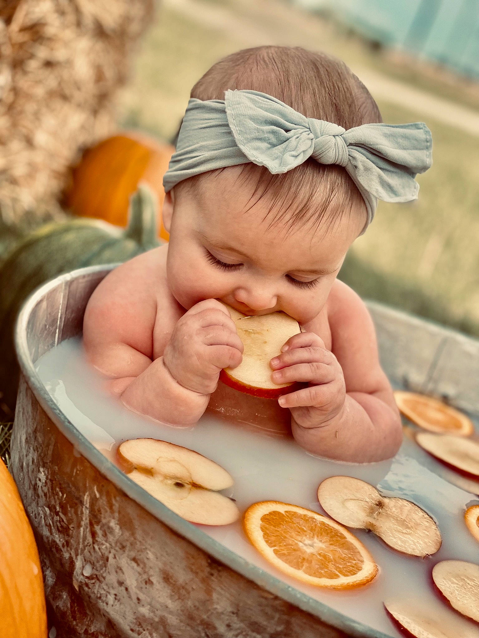 Bonnie is registered to the contest to win money with this photo: baby, child, cuisine, dish, dishware, finger, food, food_craving, happy, ingredient, nail, orange, people, person, plate, serveware, skin, sweetness, tableware, thumb