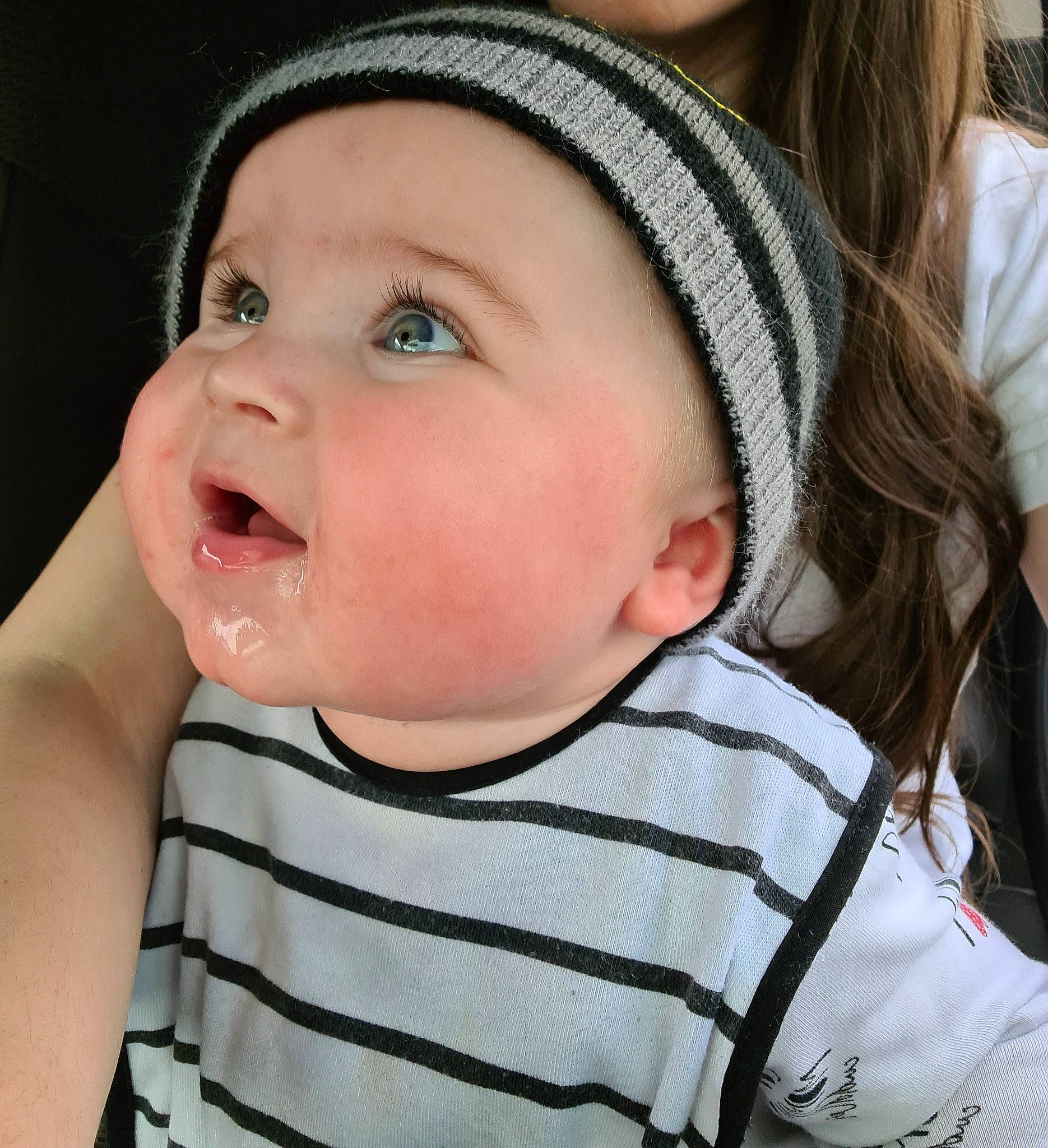 Hayden is registered to the contest to win money with this photo: baby, cap, cheek, chin, eye, eyebrow, eyelash, face, flash_photography, happy, headgear, headwear, human_body, iris, lip, mouth, neck, nose, person, skin