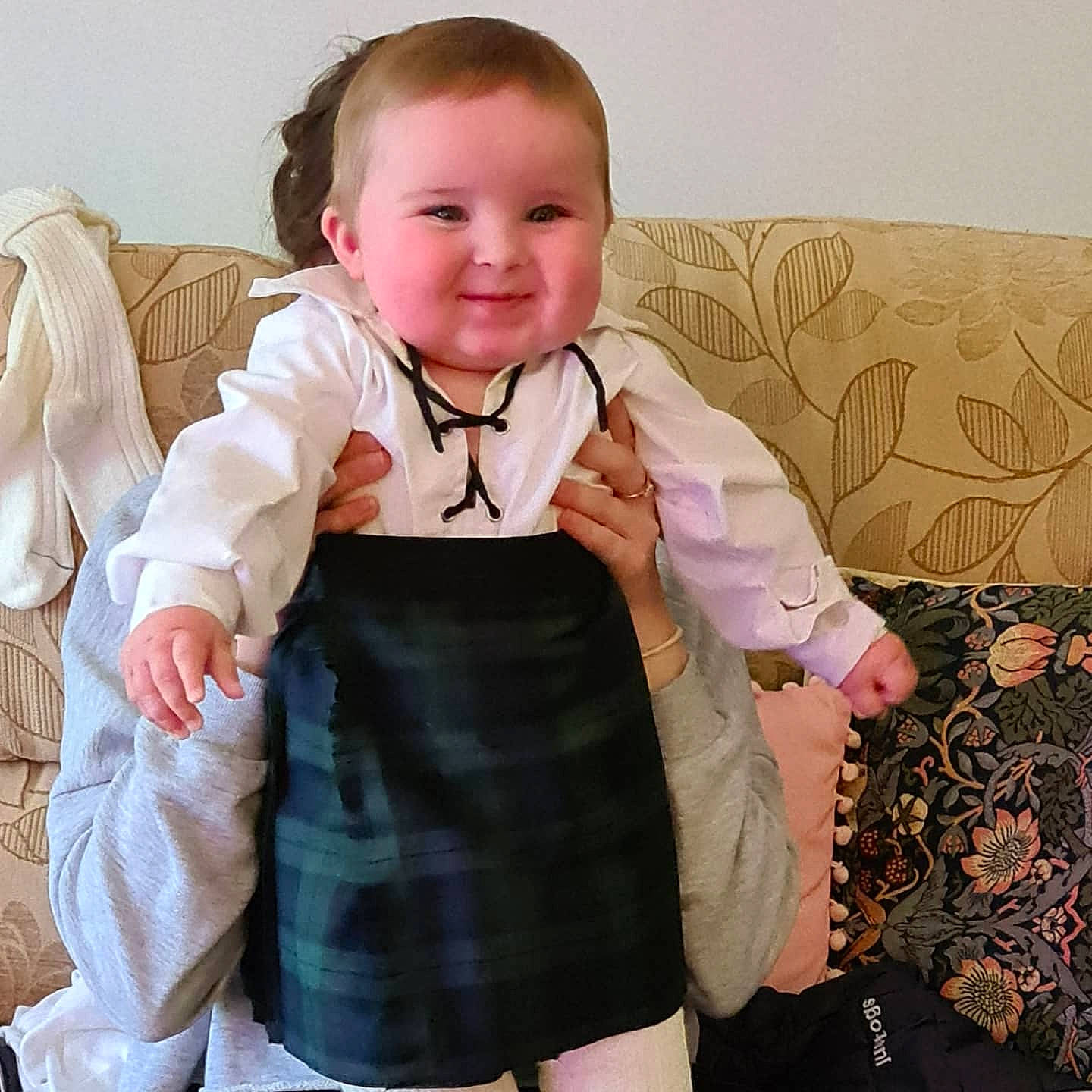 Hayden is registered to the contest to win money with this photo: baby, baby_toddler_clothing, bow_tie, cheek, collar, dress_shirt, face, finger, formal_wear, happy, head, joy, neck, pattern, person, shoulder, skin, sleeve, smile, textile