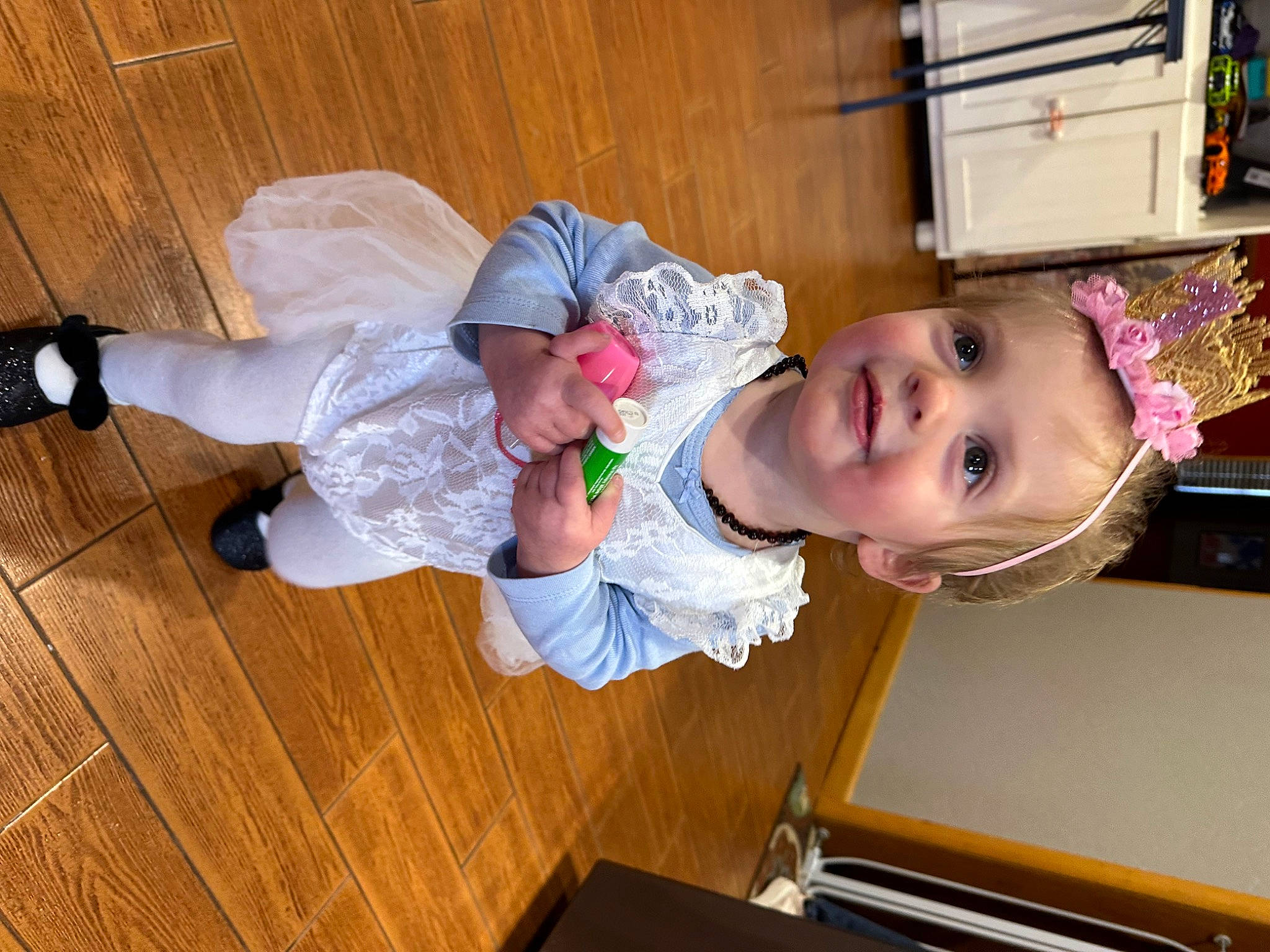Adalynn joined the competition — help win amazing prizes! baby, baby_toddler_clothing, child, comfort, flooring, fun, hardwood, joy, person, room, sitting, smile, sock, toddler, varnish, wood, wood_flooring, wood_stain
