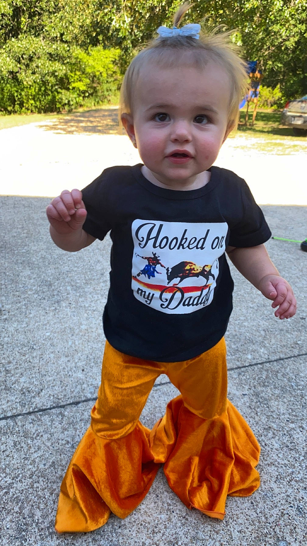 Kaisley is registered to the contest to win money with this photo: baby, baby_toddler_clothing, child, costume, event, flooring, fun, grass, hairstyle, happy, leisure, pajamas, pattern, person, plant, play, sleeve, t_shirt, toddler, top