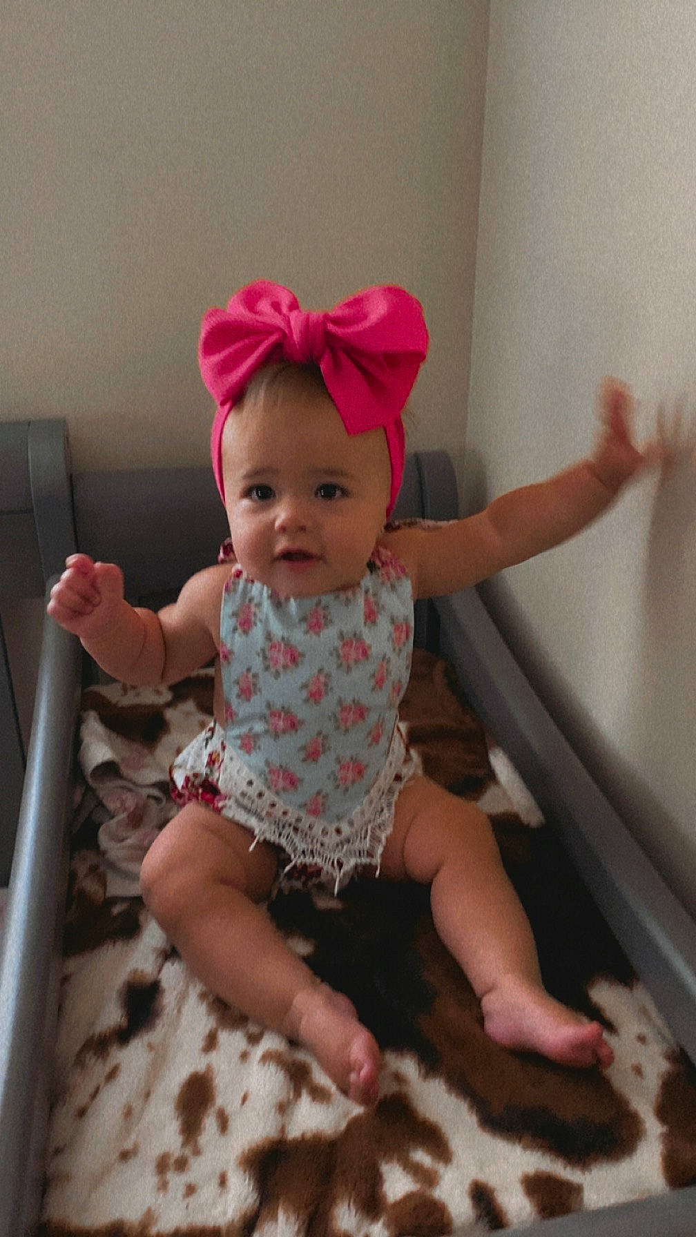 Kaisley is registered to the contest to win money with this photo: baby, baby_toddler_clothing, child, face, flooring, happy, head, human_body, human_leg, leg, pattern, person, pink, skin, sleeve, smile, t_shirt, textile, thigh, thumb