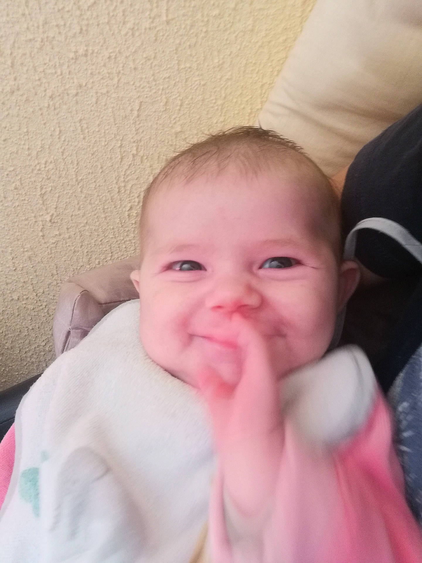 Lucy participe au concours pour gagner de l'argent avec cette photo : abdomen, baby, baby_toddler_clothing, cheek, chest, comfort, eye, eyelash, gesture, happy, human_body, joy, lip, nail, person, pink, skin, sleeve, smile, thumb