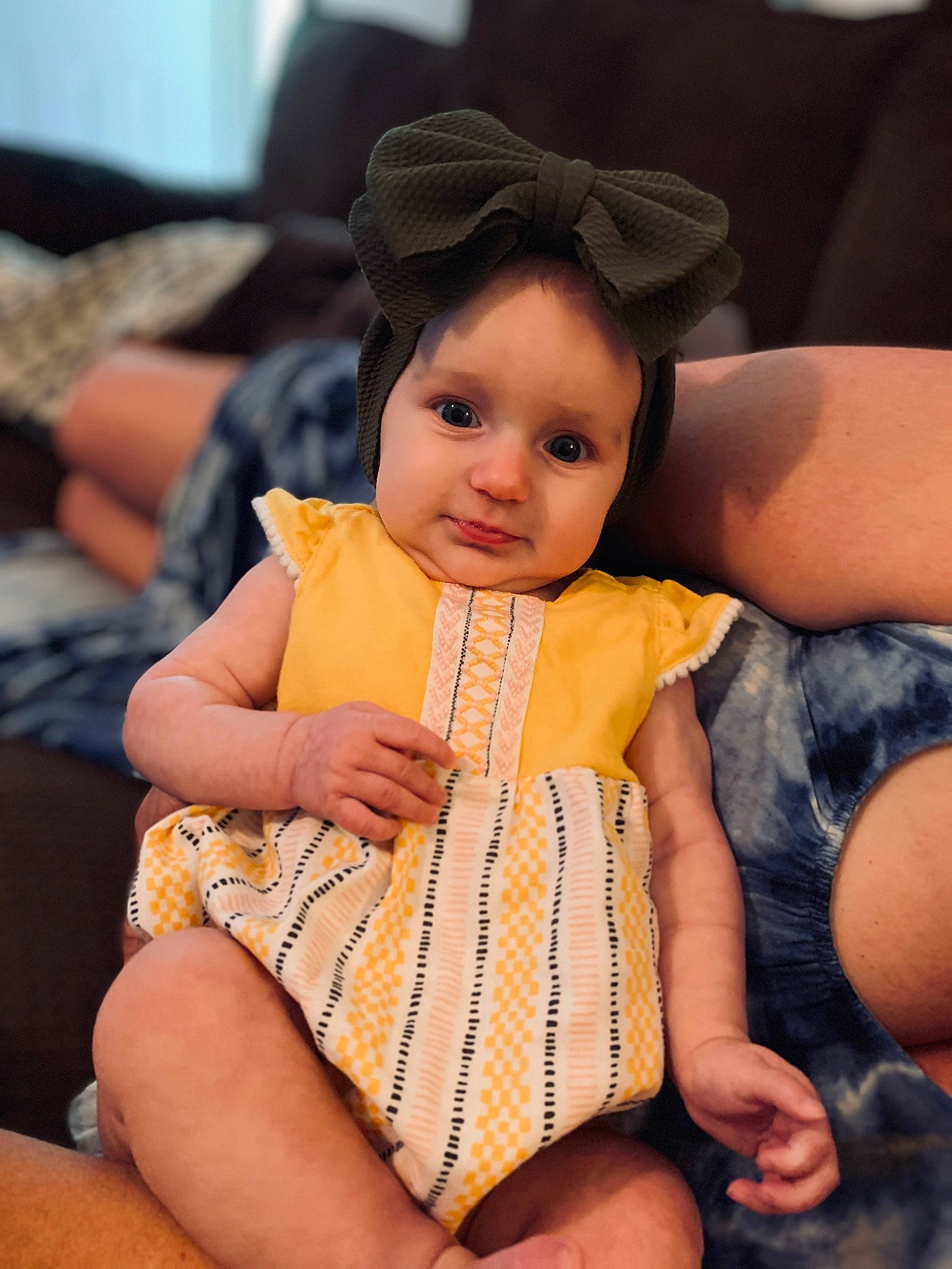 Reidlyn joined the competition — help win amazing prizes! baby, baby_toddler_clothing, child, comfort, event, facial_expression, fashion, finger, fun, hairstyle, happy, human, human_leg, lap, leisure, mammal, person, sitting, skin, thigh