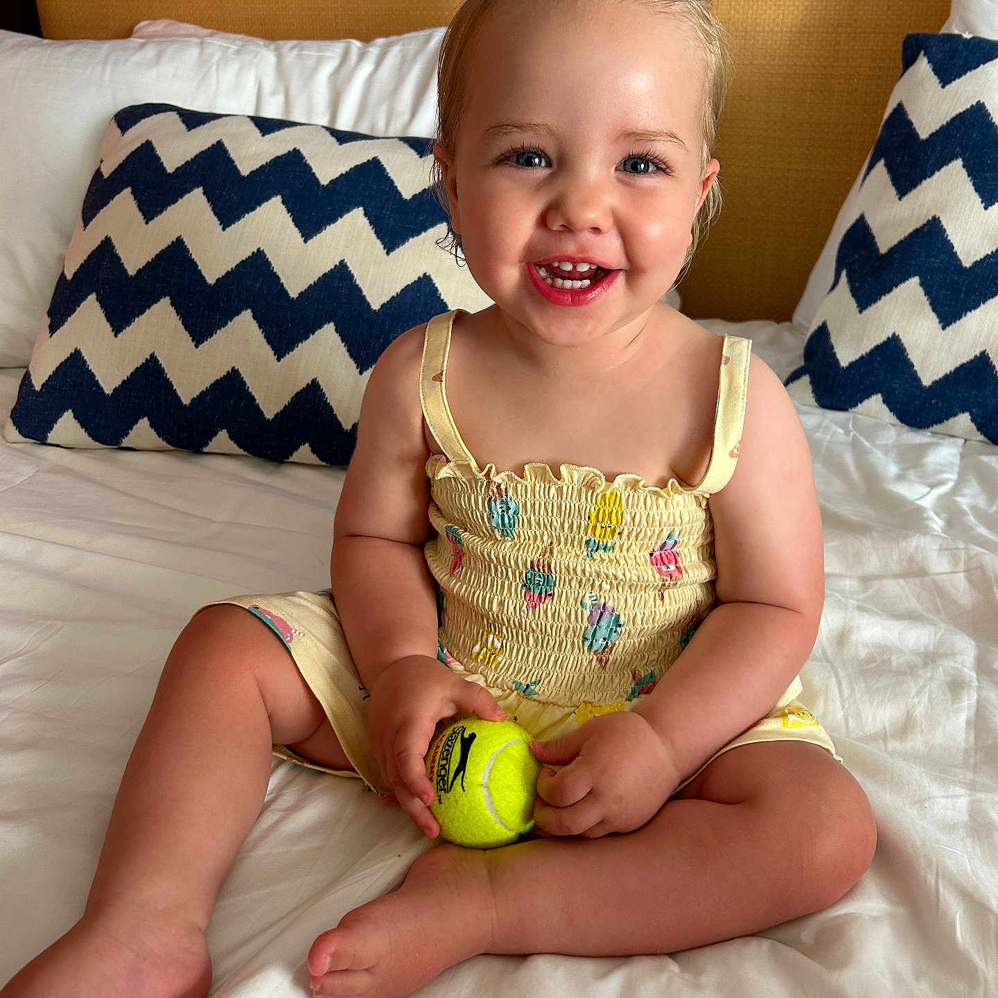 Poppy joined the competition — help win amazing prizes! baby, ball, bodypart, couch, cushion, face, finger, football, furniture, hand, head, homedecor, person, photography, portrait, soccer, soccerball, sport, tennis, tennisball