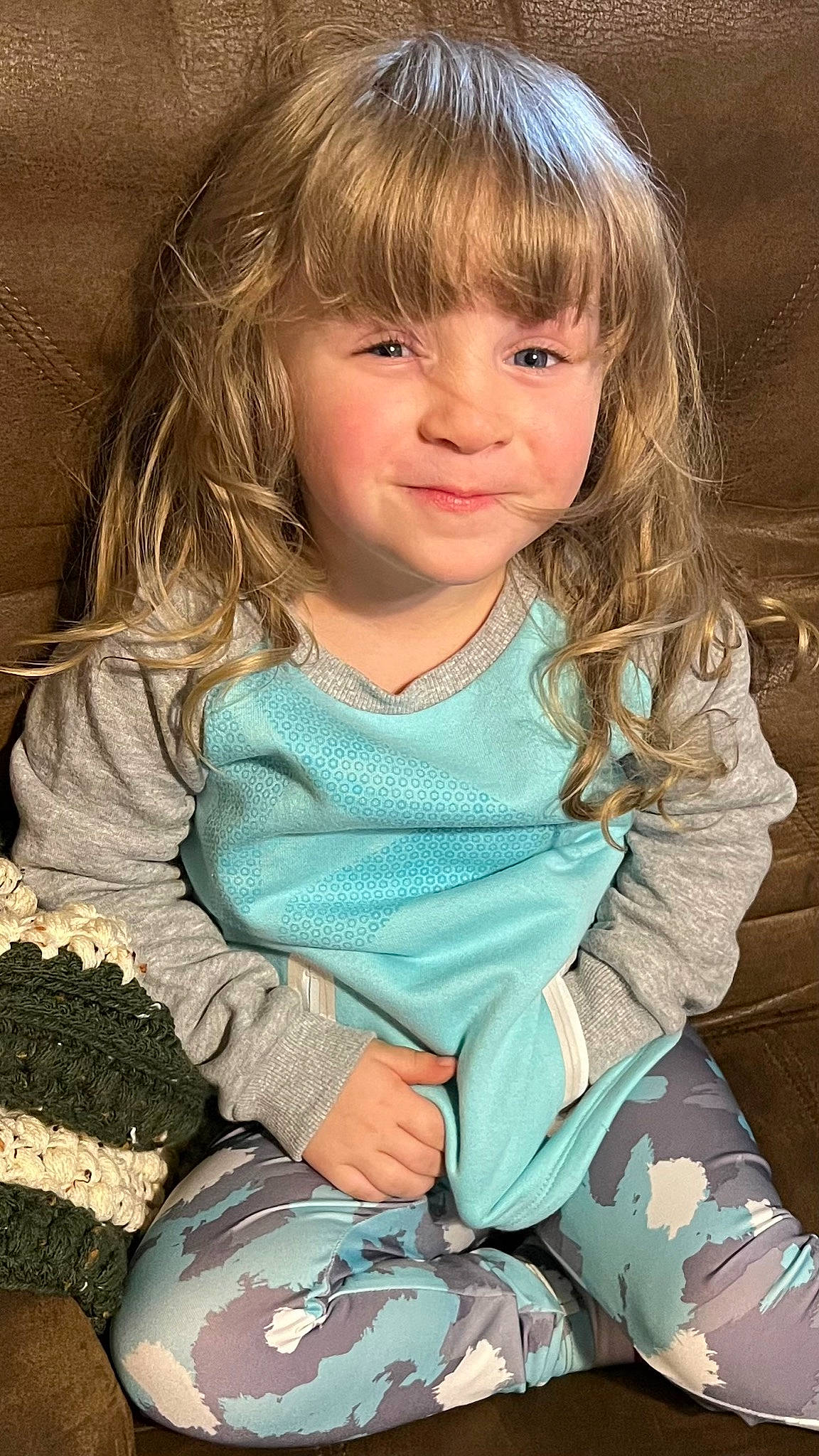 Allie is registered to the contest to win money with this photo: cheek, chin, eye, face, facial_expression, hair, hairstyle, head, human, human_body, iris, joy, lip, nose, organ, outerwear, person, skin, sleeve, smile