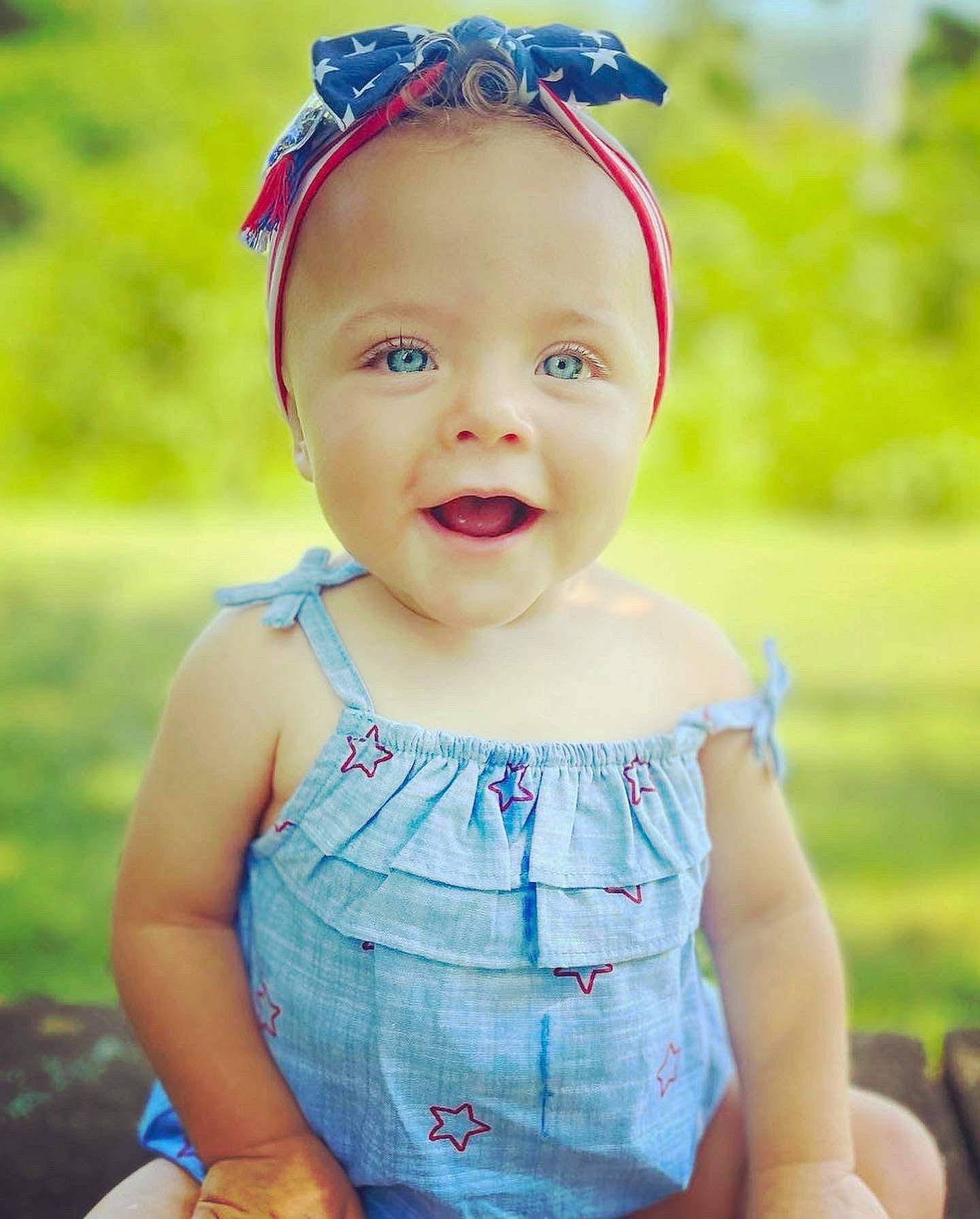 Juliana joined the competition — help win amazing prizes! baby, baby_toddler_clothing, cap, child, electric_blue, face, grass, happy, head, headgear, iris, lip, pattern, people_in_nature, person, pink, skin, sleeve, smile, summer