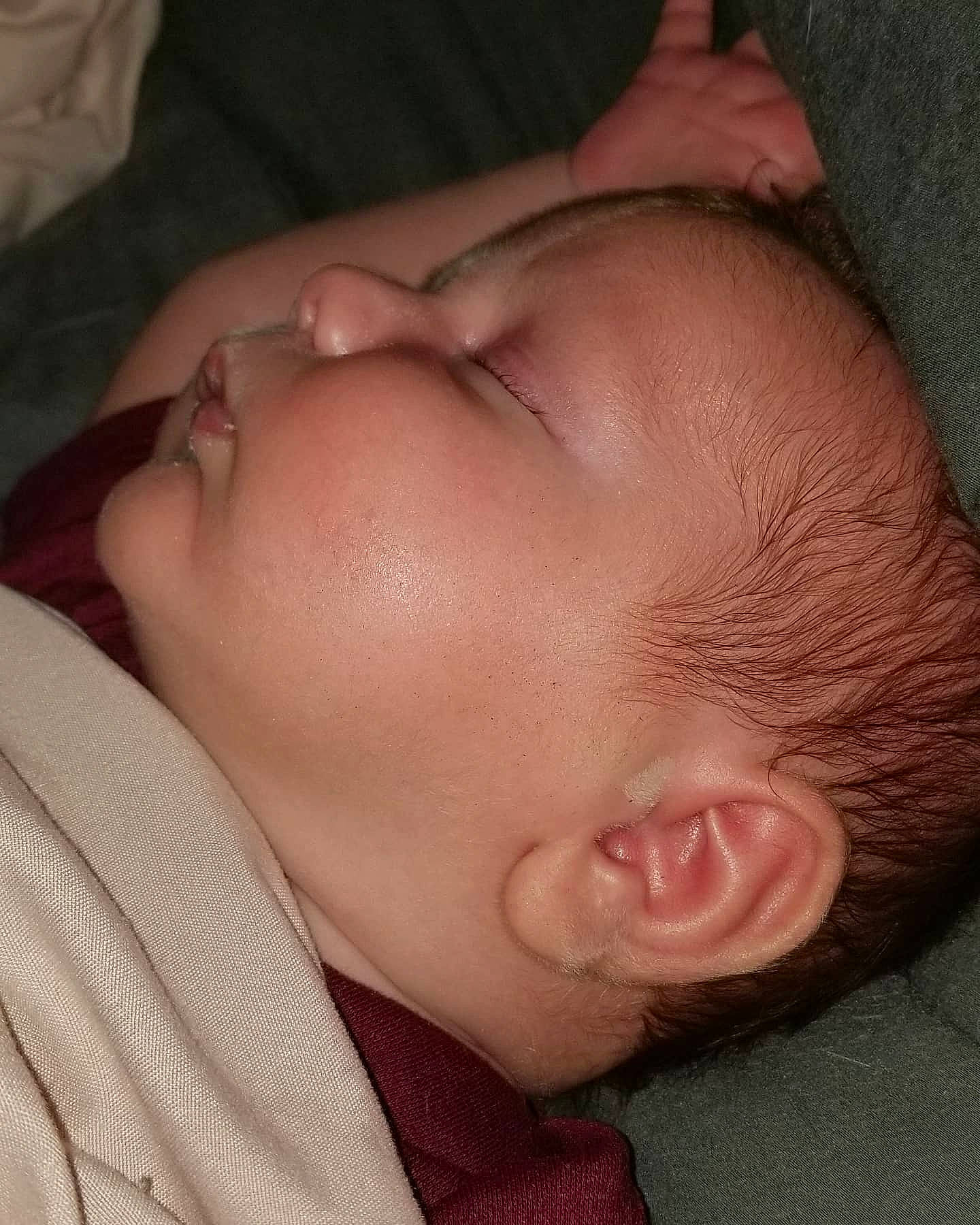 Ronin is registered to the contest to win money with this photo: baby, cheek, child, chin, close_up, ear, eye, eyebrow, face, forehead, hand, head, lip, mouth, muscle, nap, neck, nose, person, skin