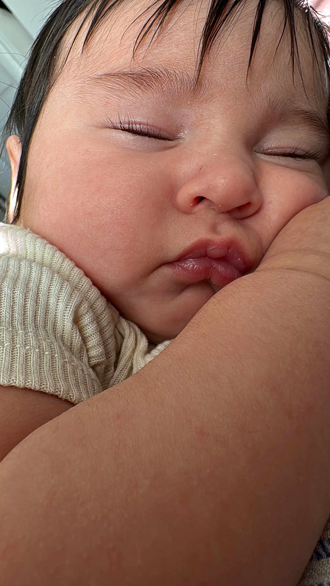 Santi is registered to the contest to win money with this photo: adorable, arm, baby, cheek, child, closeup, cozy, cute, eyelashes, face, infant, knit, peaceful, portrait, relaxing, resting, skin, sleeping, soft, young