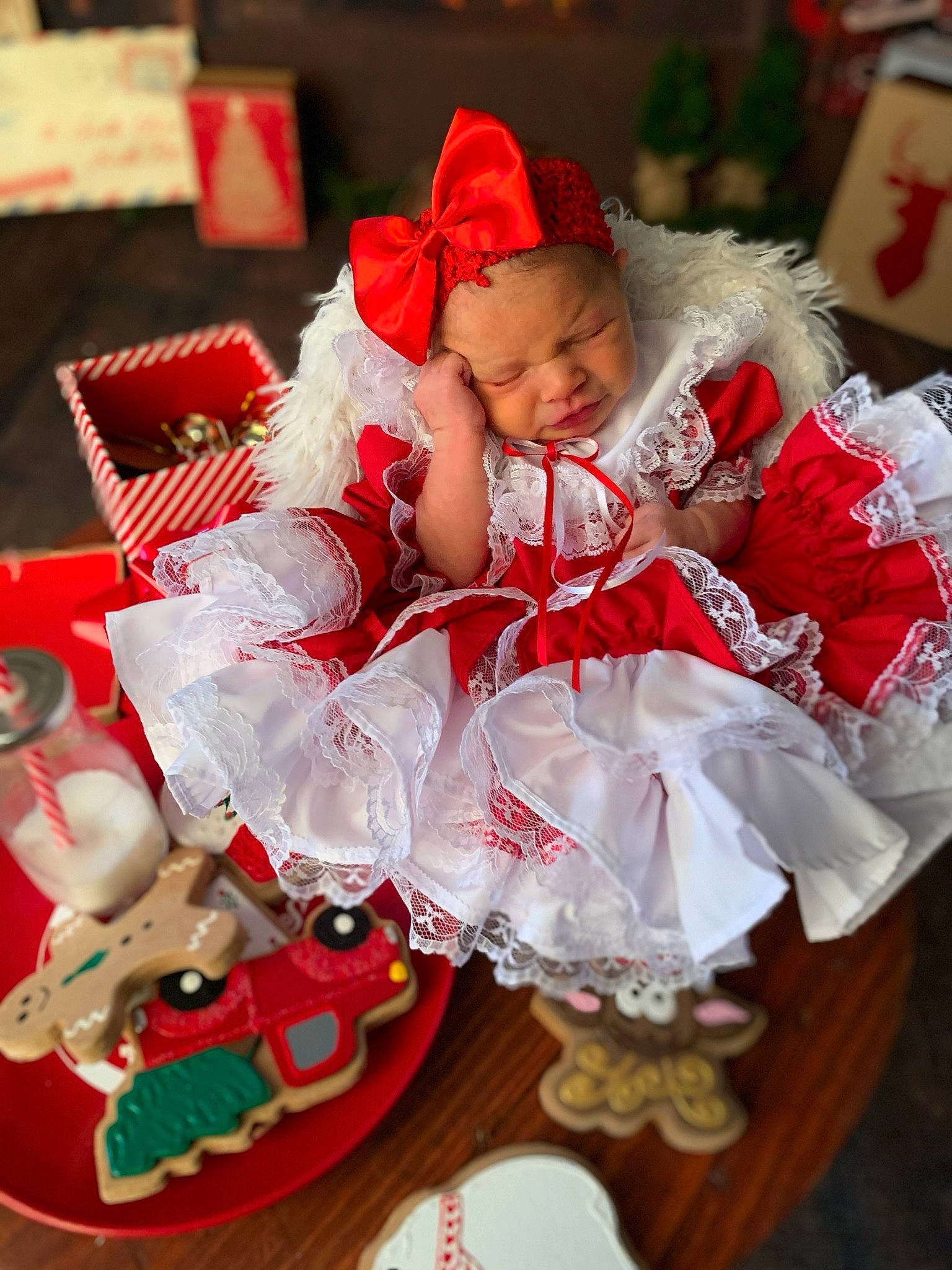 River is registered to the contest to win money with this photo: baby, child, christmas, christmas_eve, costume, person, red, smile, toddler